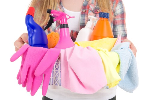 Weekly cleaning tasks in an Ilford household kitchen and bathroom